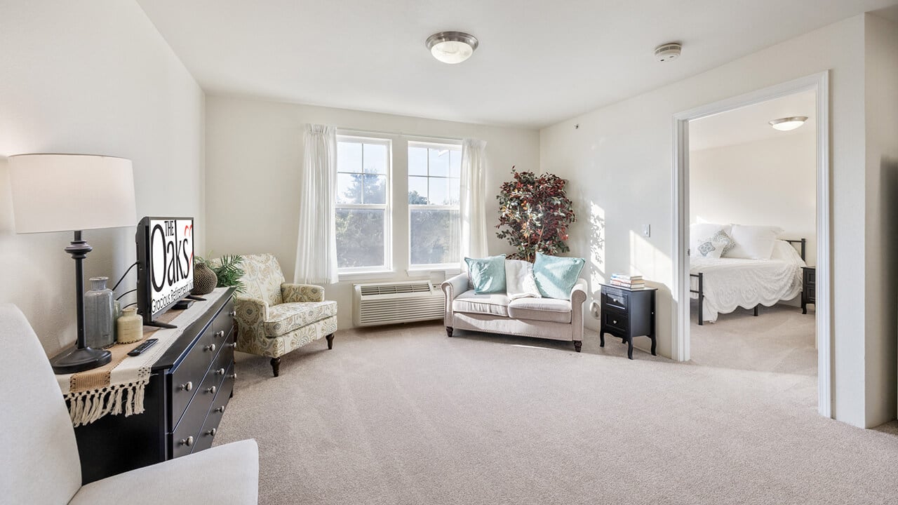 A living room in a The Oaks apartment
